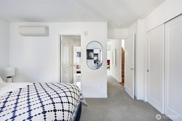 1117 34th Ave Unit B, Seattle, WA 98122 - carpeted bedroom with a wall unit AC and a closet