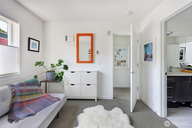 1117 34th Ave Unit B, Seattle, WA 98122 - carpeted bedroom featuring baseboards and ensuite bathroom