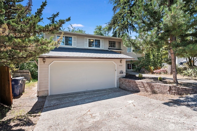 10122 50th Pl W, Mukilteo, WA 98275 - view of front of house featuring driveway, roof with shingles, and an attached garage