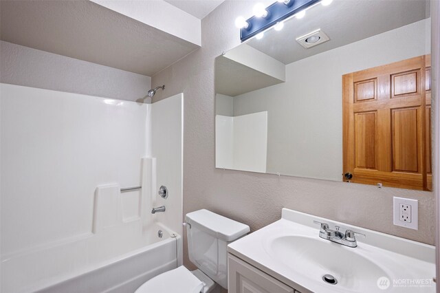 10122 50th Pl W, Mukilteo, WA 98275 - full bathroom featuring vanity,  shower combination, and a textured wall