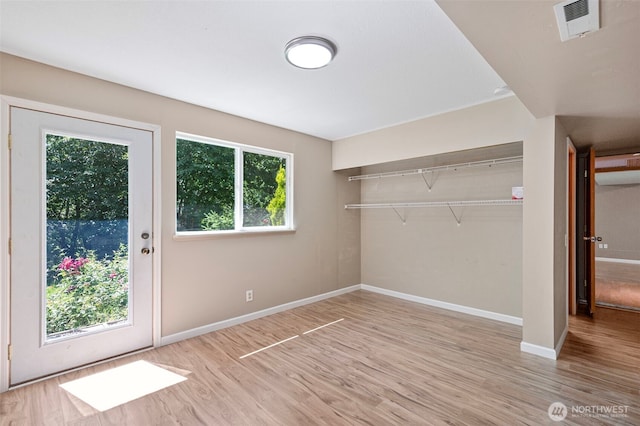 10122 50th Pl W, Mukilteo, WA 98275 - unfurnished bedroom with light wood-style floors and access to outside