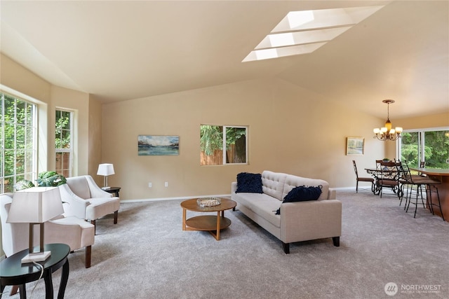 6401 151st St NW, Gig Harbor, WA 98332 - carpeted living area featuring a chandelier, vaulted ceiling, and a skylight