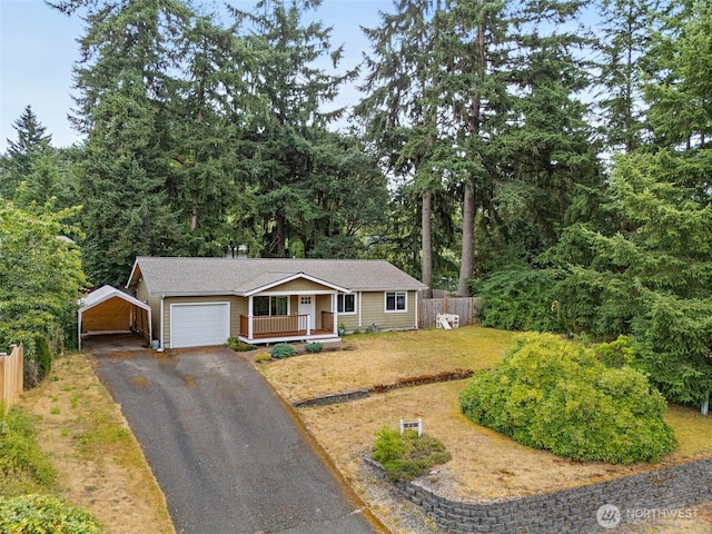 828 Gregory Way SE, Olympia, WA 98513 - ranch-style home featuring a carport, driveway, a porch, and an attached garage