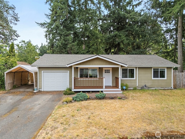 828 Gregory Way SE, Olympia, WA 98513 - single story home featuring covered porch, driveway, a detached carport, a garage, and a shingled roof