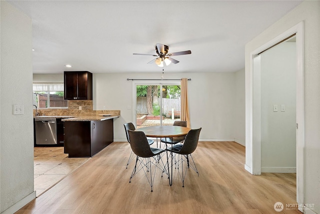 828 Gregory Way SE, Olympia, WA 98513 - dining room featuring light wood-style floors, a ceiling fan, healthy amount of natural light, and recessed lighting