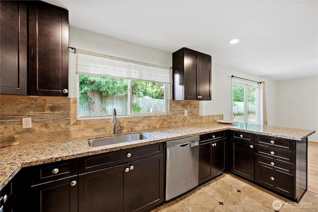 828 Gregory Way SE, Olympia, WA 98513 - kitchen with stainless steel dishwasher, backsplash, a peninsula, dark brown cabinets, and recessed lighting