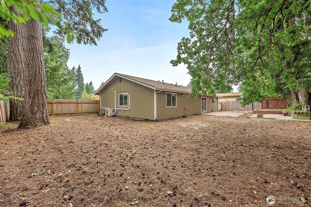 828 Gregory Way SE, Olympia, WA 98513 - rear view of house with a fenced backyard