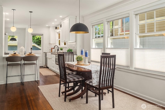 6518 18th Ave NE, Seattle, WA 98115 - dining room featuring plenty of natural light, dark wood finished floors, and recessed lighting