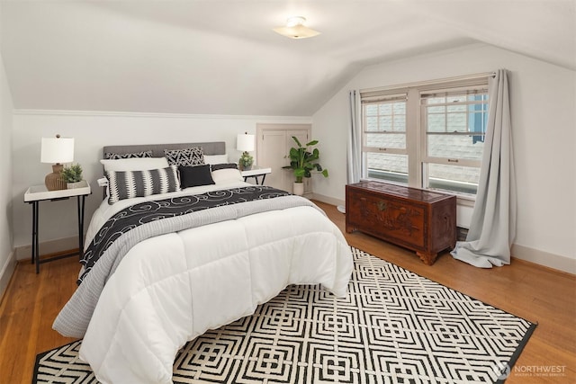 6518 18th Ave NE, Seattle, WA 98115 - bedroom with lofted ceiling and wood finished floors