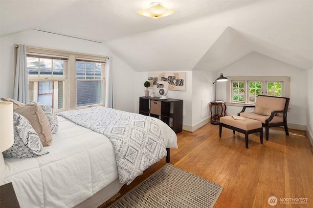 6518 18th Ave NE, Seattle, WA 98115 - bedroom featuring vaulted ceiling and light wood-type flooring
