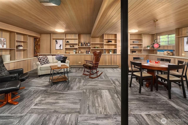 6518 18th Ave NE, Seattle, WA 98115 - living area featuring wood ceiling, a baseboard heating unit, and a baseboard radiator