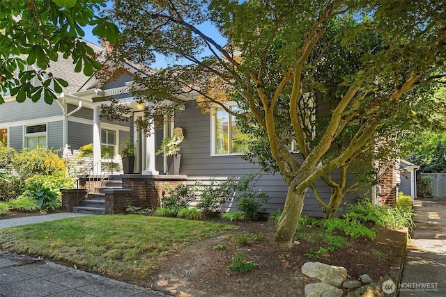 6518 18th Ave NE, Seattle, WA 98115 - view of front of property featuring covered porch and a garage