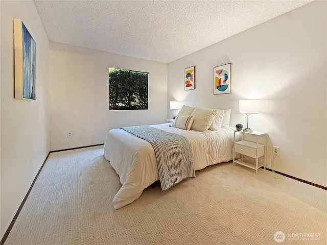 12611 NE 145th Pl Unit H85, Kirkland, WA 98034 - bedroom with light colored carpet and a textured ceiling