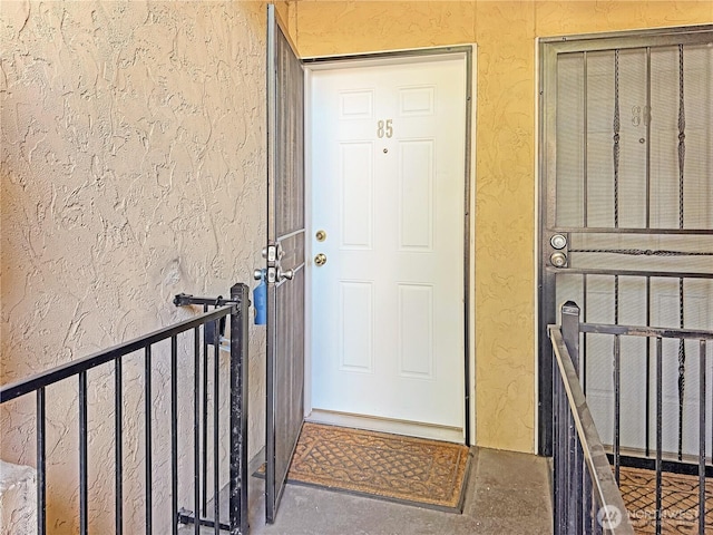 12611 NE 145th Pl Unit H85, Kirkland, WA 98034 - property entrance featuring stucco siding