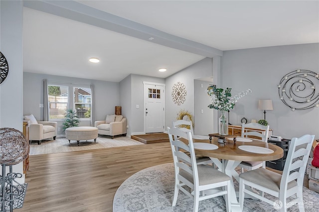 10707 209th Ave E, Bonney Lake, WA 98391 - dining room with vaulted ceiling, light wood-style floors, and recessed lighting