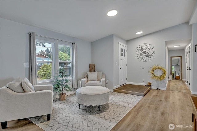 10707 209th Ave E, Bonney Lake, WA 98391 - living area featuring wood finished floors and recessed lighting