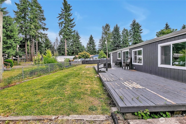10707 209th Ave E, Bonney Lake, WA 98391 - fenced backyard with a deck