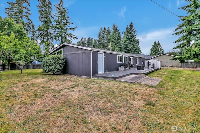 10707 209th Ave E, Bonney Lake, WA 98391 - rear view of house featuring a wooden deck