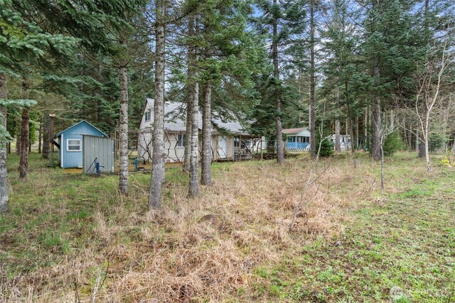 1869 Van Hoesen Rd, Onalaska, WA 98570 - view of yard featuring a storage shed