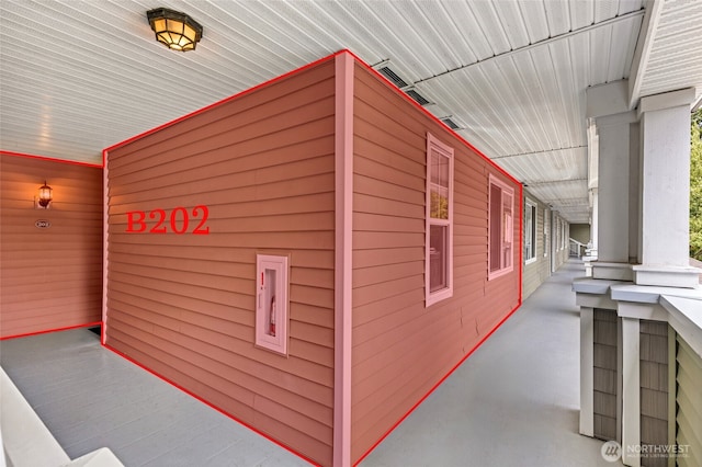 12712 Admiralty Way Unit B202, Everett, WA 98204 - view of home's exterior featuring covered porch