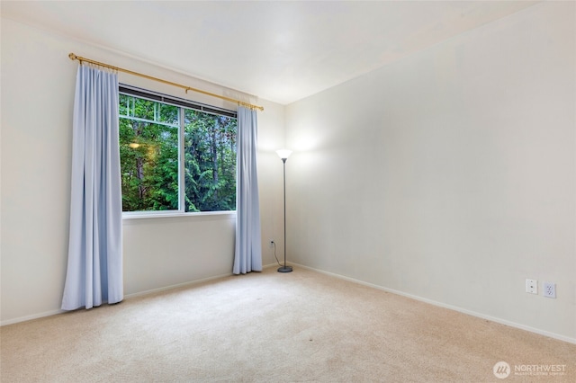 12712 Admiralty Way Unit B202, Everett, WA 98204 - empty room with carpet and baseboards