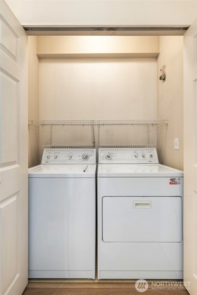 12712 Admiralty Way Unit B202, Everett, WA 98204 - laundry area with washing machine and clothes dryer