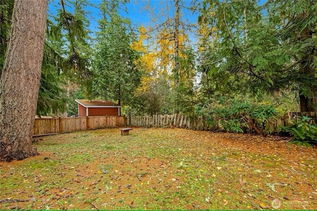 5579 NE Foster Rd, Bainbridge Island, WA 98110 - fenced backyard featuring a shed