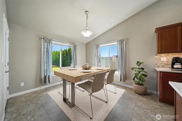 1330 Caprio Loop, Walla Walla, WA 99362 - dining space with vaulted ceiling and light tile patterned flooring