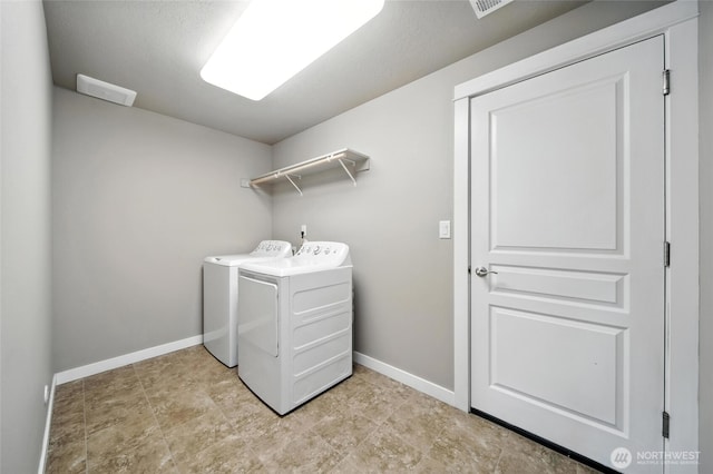 1330 Caprio Loop, Walla Walla, WA 99362 - laundry room featuring separate washer and dryer and baseboards