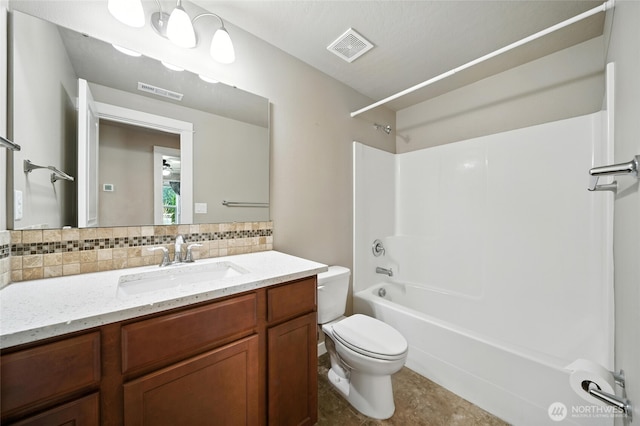 1330 Caprio Loop, Walla Walla, WA 99362 - bathroom featuring vanity, backsplash, and bathing tub / shower combination