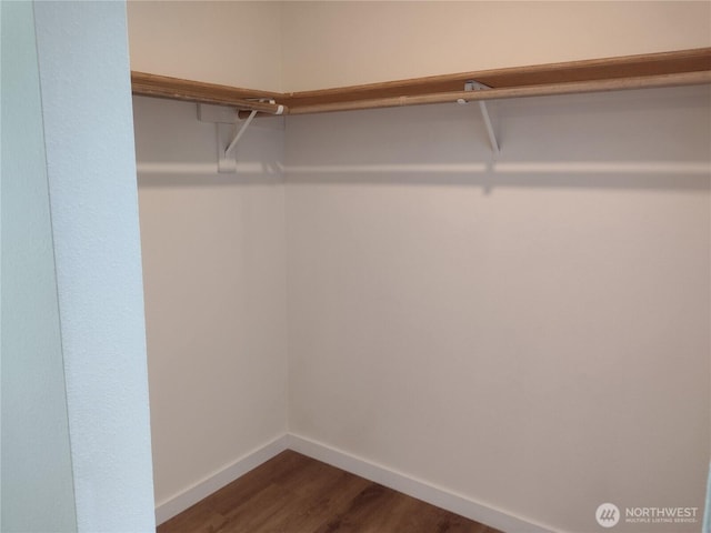 6245 S Huson St, Tacoma, WA 98409 - spacious closet featuring dark wood-style flooring