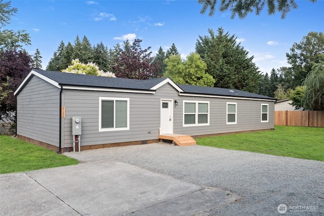 2120 77th Street Ct E, Tacoma, WA 98404 - manufactured / mobile home featuring a patio and a shingled roof