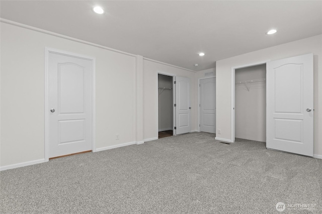2120 77th Street Ct E, Tacoma, WA 98404 - unfurnished bedroom with multiple closets, carpet, and recessed lighting