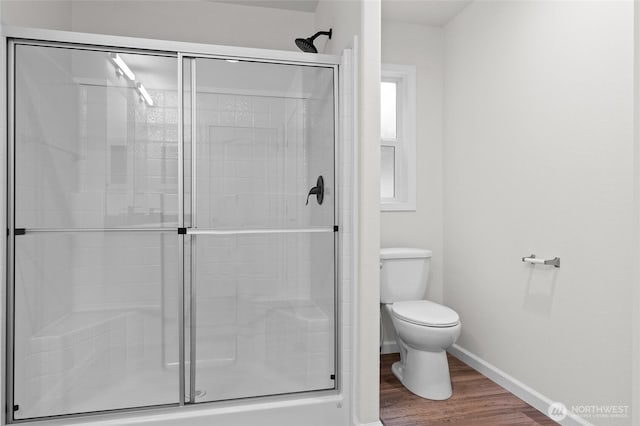 2120 77th Street Ct E, Tacoma, WA 98404 - full bath featuring a stall shower and wood finished floors