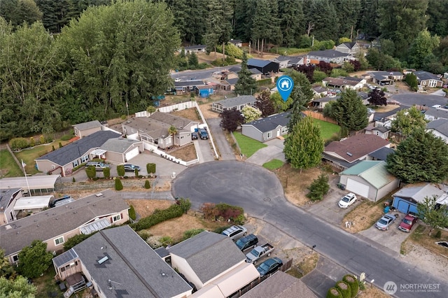 2120 77th Street Ct E, Tacoma, WA 98404 - aerial view of property's location with nearby suburban area and a heavily wooded area