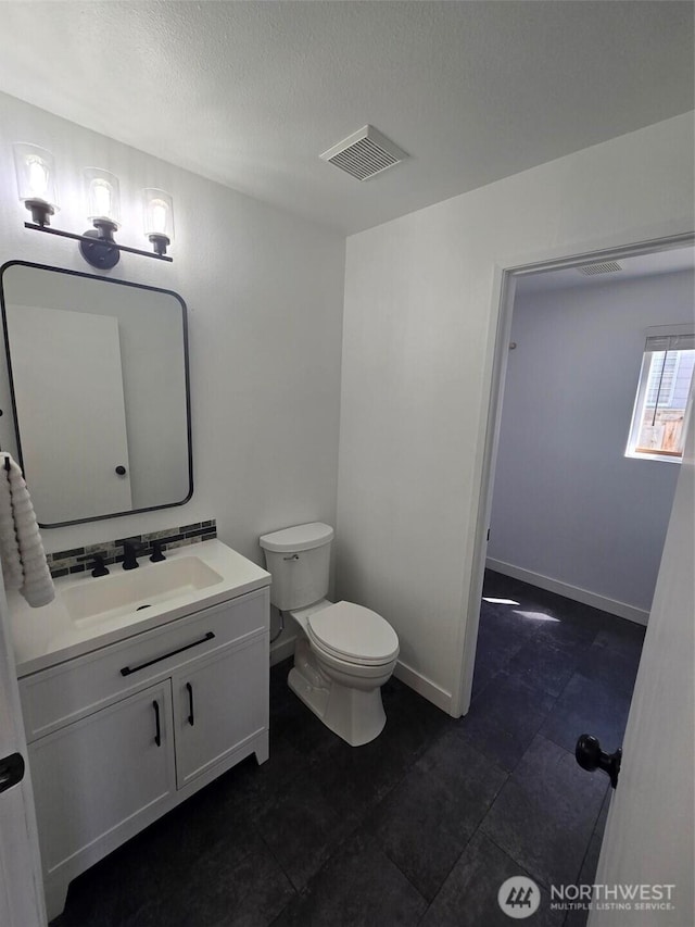 7106 201st St E, Spanaway, WA 98387 - bathroom with vanity and a textured ceiling
