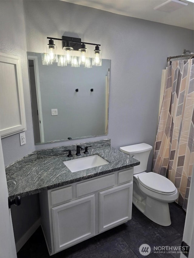 7106 201st St E, Spanaway, WA 98387 - bathroom featuring vanity, a shower with shower curtain, and tile patterned flooring