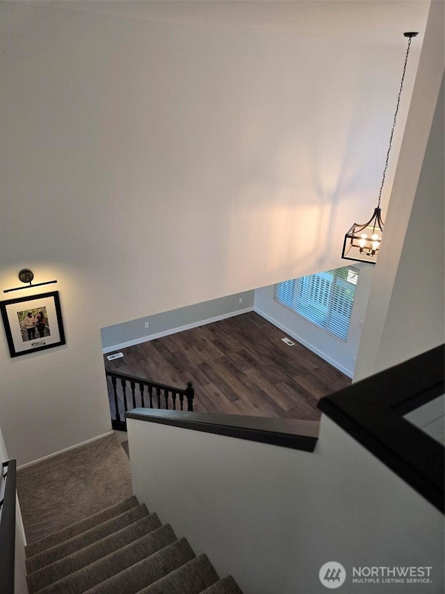 7106 201st St E, Spanaway, WA 98387 - stairway featuring baseboards and wood finished floors