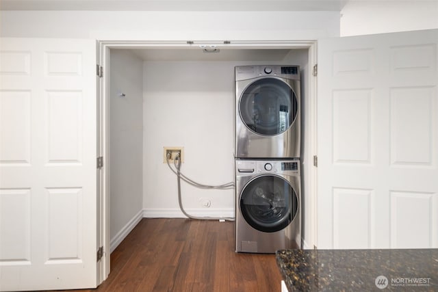9822 NE 122nd St Unit U101, Kirkland, WA 98034 - washroom featuring stacked washing machine and dryer and dark wood-type flooring