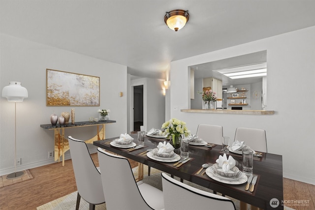 500 W Roy St Unit W103, Seattle, WA 98119 - dining area with wood finished floors
