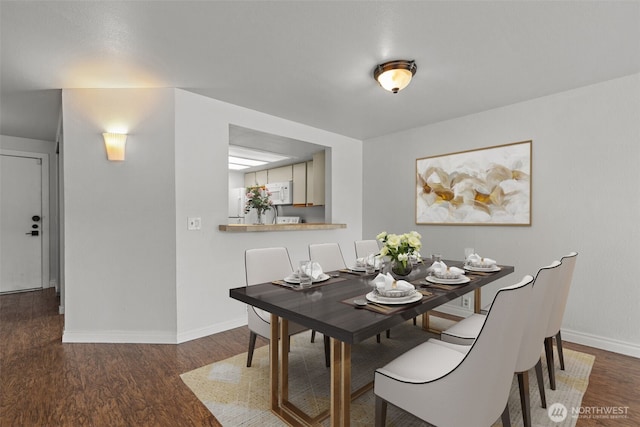 500 W Roy St Unit W103, Seattle, WA 98119 - dining space with wood finished floors and baseboards