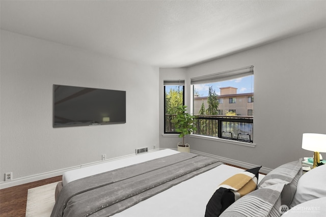 500 W Roy St Unit W103, Seattle, WA 98119 - bedroom featuring wood finished floors and baseboards