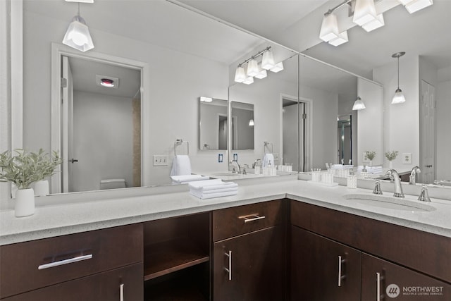 500 W Roy St Unit W103, Seattle, WA 98119 - bathroom with double vanity and toilet