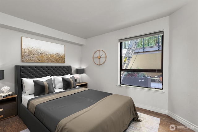 500 W Roy St Unit W103, Seattle, WA 98119 - bedroom featuring wood finished floors and baseboards