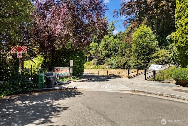 500 W Roy St Unit W103, Seattle, WA 98119 - view of asphalt road featuring sidewalks, curbs, and traffic signs