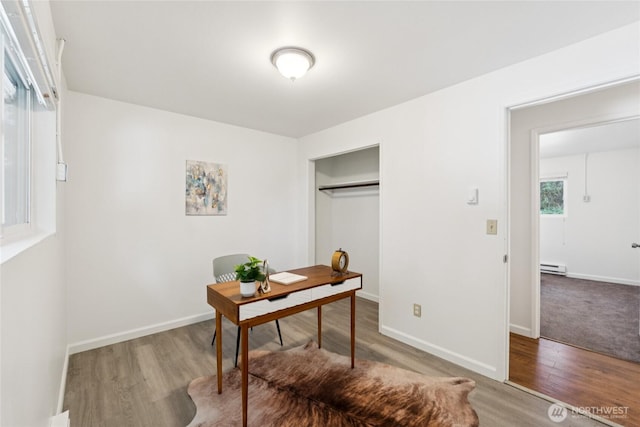 19520 Grannis Rd, Bothell, WA 98012 - office space featuring a baseboard radiator and wood finished floors