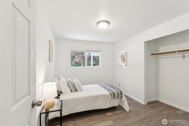 19520 Grannis Rd, Bothell, WA 98012 - bedroom featuring wood finished floors and a closet