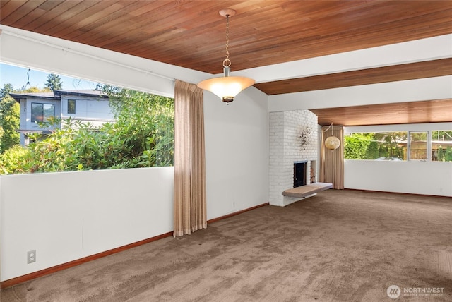 4728 86th Ave SE, Mercer Island, WA 98040 - unfurnished living room with carpet floors, a brick fireplace, and wood ceiling