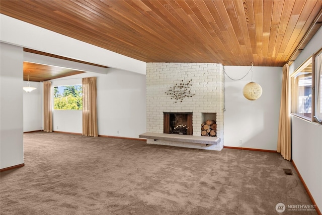 4728 86th Ave SE, Mercer Island, WA 98040 - unfurnished living room featuring carpet flooring, wooden ceiling, and a brick fireplace