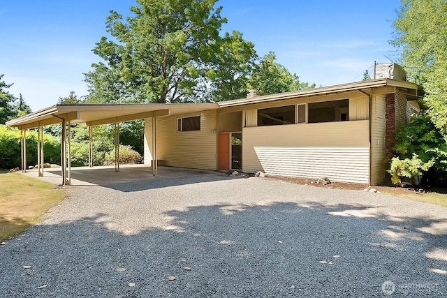 4728 86th Ave SE, Mercer Island, WA 98040 - view of front of home featuring a carport and driveway